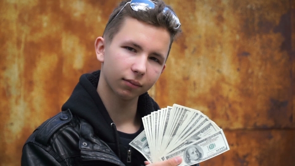 Footage Teenager Showing Off Their Money. alt