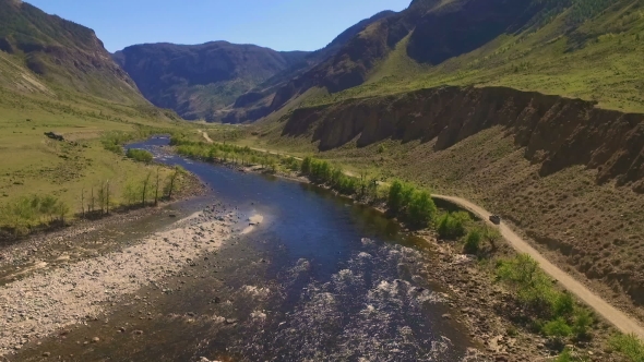 Car On a Winding Road In The Mountains alt