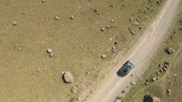 Car On a Winding Road In The Mountains alt
