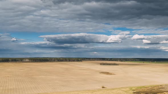 Early Spring Countryside Rural Field Landscape In Spring Cloudy Day alt