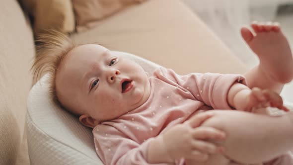 Blue-eyed Baby at Home alt