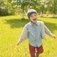 Young Kid Running and Smiling in the Park - VideoHive Item for Sale