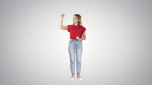 Smiling woman in casual clothes presenting something pushing alt