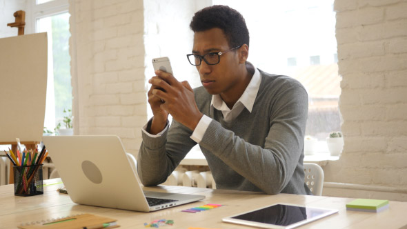 Typing Message Black man in Office alt