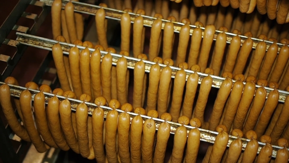 Ready-made Sausages Hanging In The Store Freezer Waiting For The Plant To Be Distributed. Sausage