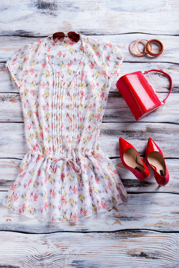 Blouse and red heel shoes.