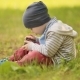 Three-year Baby Playing With Phone On Grass - VideoHive Item for Sale
