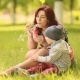 Young Mother And Baby Blow Bubbles - VideoHive Item for Sale