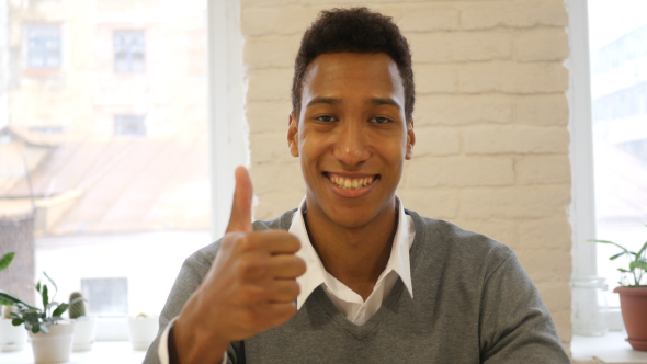 Thumbs Up, Success by Young Man alt