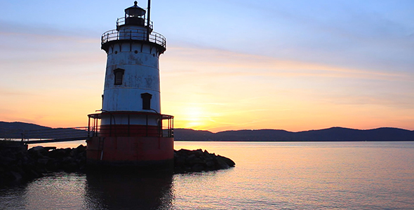 Historic River Lighthouse at Sunset alt