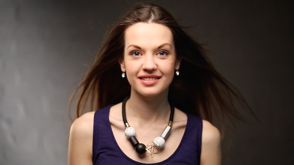 Gorgeous Girl With Her Hair On Wind