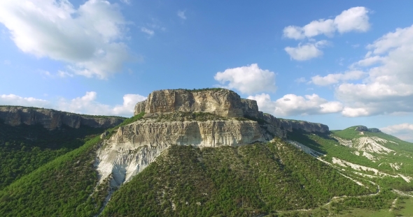 Small White Mountain With Trees