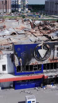 Vertical Video of a Bombed Shopping Center During the War in Bucha Ukraine alt
