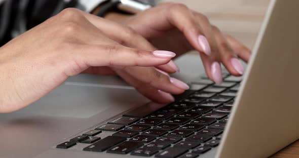 Female hands of black business woman professional user worker using typing on laptop.