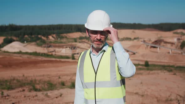 Portrait Handsome Man Sand Quarry Worker Wearing Safety Uniform alt