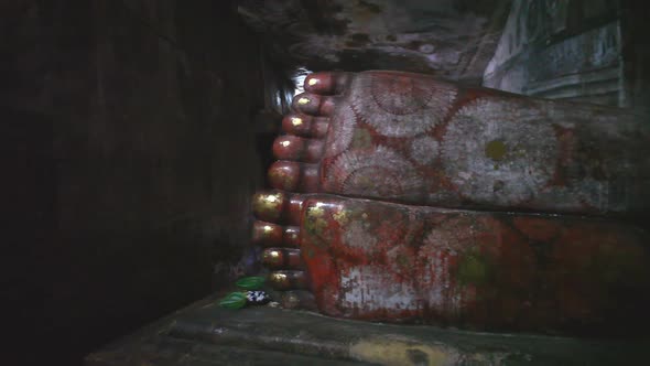 DAMBULLA, SRI LANKA - FEBRUARY 2014: The view of a sleeping Buddha's feet at the Golden Temple of Da alt