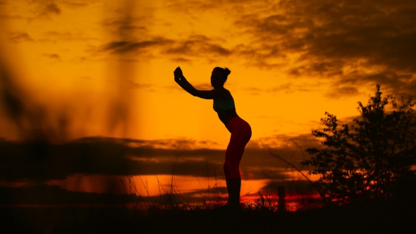 Carefree Woman Dancing In The Sunset. Vacation Vitality Healthy Living Concept. alt