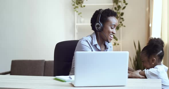 Business Woman Student in Headphones Head Microphone Speaks with Clients Colleagues Working Remotely alt