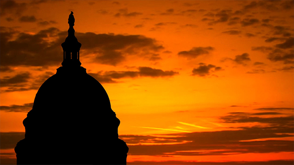 United States Capitol Dome Silhouette Over Sunrise