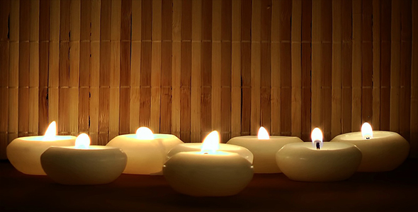 Candles on Bamboo Background
