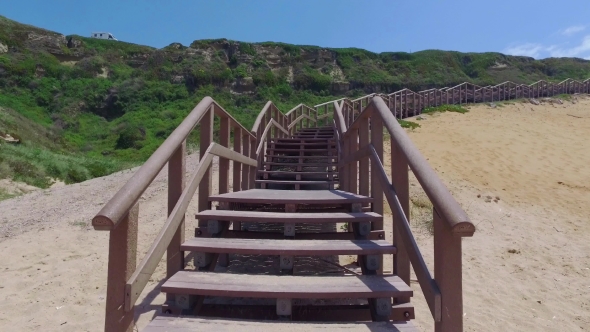 Climb Up Via Wooden Stairs With Railing