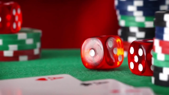 Red Dice In Sequence Rolls, Casino Chips, Cards On Green Felt