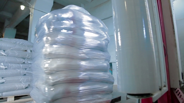 Stretch Wrapping Machine In The Warehouse alt