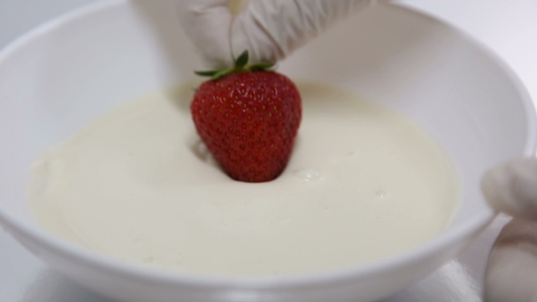 Dipping Strawberry In White Chocolate