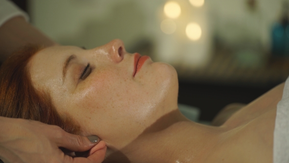 The Woman Doing The Massage Of The Ears alt