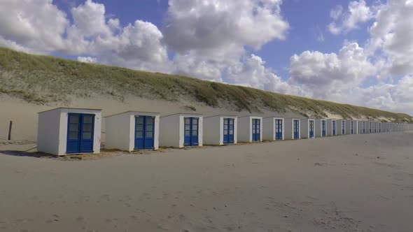 Small beach houses on the beach of Texel. alt