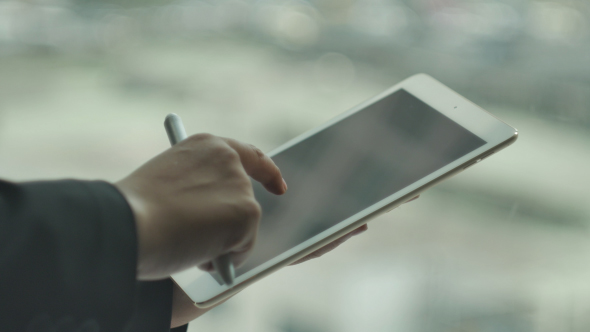 Businessman Using Tablet alt