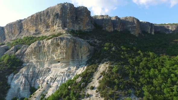 Flight Over Trees In Mountains
