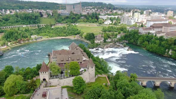 Flying over Laufen Castle (German: Schloss Laufen) at Rhine Falls in Switzerland alt