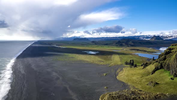 Timelapse of the Black Sand Beach From the Cliff of Dyrholaeyjarviti Iceland alt