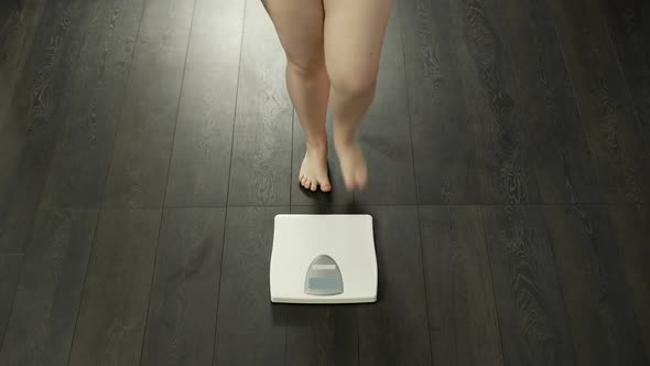 Successful Dieting, Chubby Lady Measuring Weight, Satisfied With Results alt