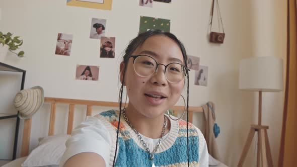 POV of Asian Teenage Girl Recording Video Blog alt