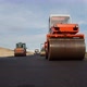 Four Pavers Ride And Flatten The Hot Asphalt - VideoHive Item for Sale