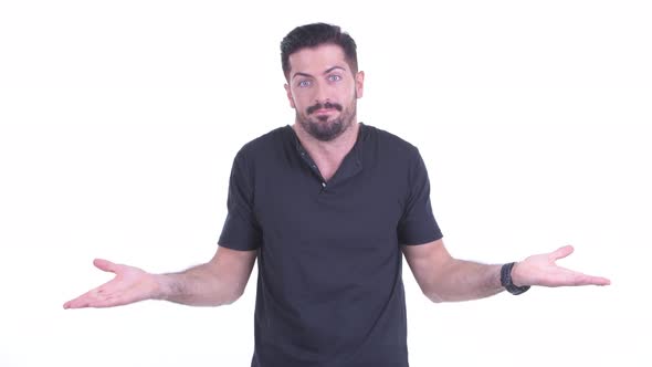 Confused Young Handsome Bearded Man Shrugging Shoulders alt