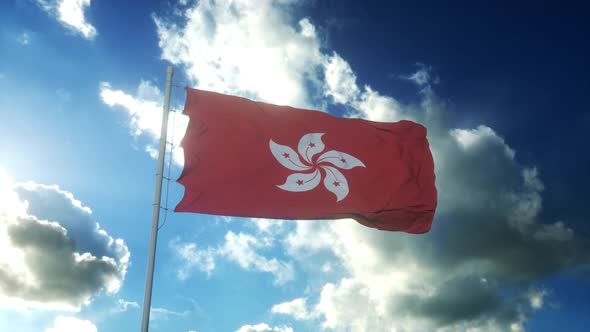 Flag of Hong Kong Waving at Wind Against Beautiful Blue Sky alt