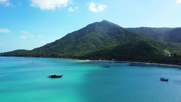 Aerial above abstract of luxury island beach holiday by blue ocean with bright sandy background of a alt