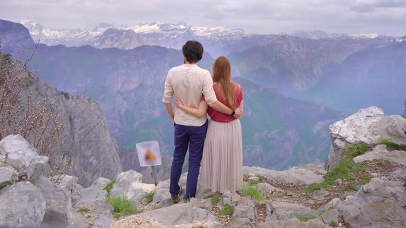Young Couple of a Man and Woman Visit the Grlo Sokolovo Famoust Canyon at the MontenegroAlbania alt