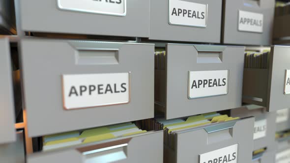 APPEALS Text on the Drawers of a File Cabinet alt