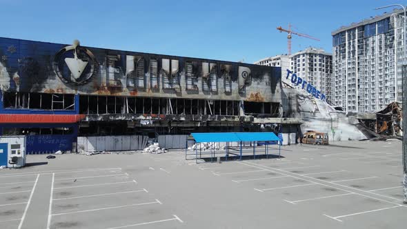 Wartorn Building of a Shopping Center in Bucha Ukraine alt