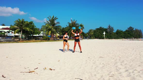 Women posing on paradise coastline beach break by transparent sea with white sand background of Koh  alt