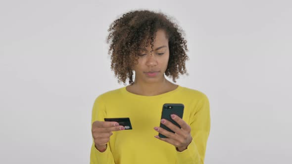 Young African Woman Shopping Online on Smartphone White Background alt