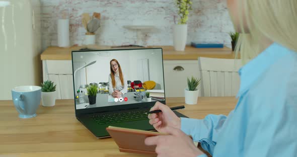 Woman Studying at Home Office Online By Conference Video Call Laptop Speak Communicates Teacher alt