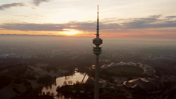 Aerial shot over Olympiaturm tower in Munich Germany alt
