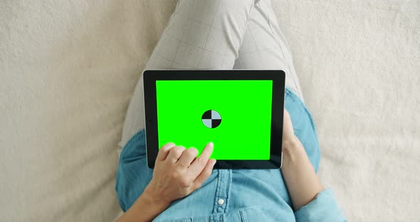 Woman Holding Tablet Chromakey Top View