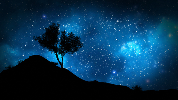 Stars Behind Silhouette Of a Hill