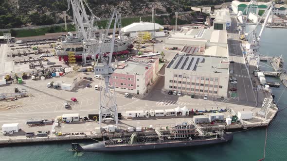 Navy submarine in Cartagena shipyard, Spain. Aerial drone view
